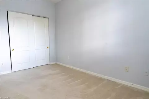 Bedroom - 8543 Pegasus Dr, Lehigh Acres, FL 33971 photo 6 of 9