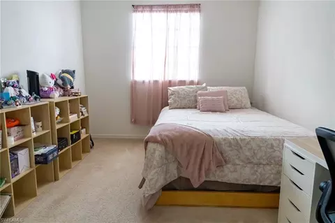 Bedroom - 8543 Pegasus Dr, Lehigh Acres, FL 33971 photo 4 of 9