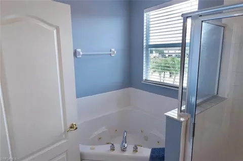 Bath - 8543 Pegasus Dr, Lehigh Acres, FL 33971 photo 3 of 7
