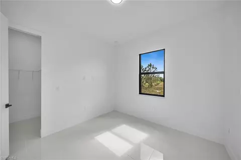 Bedroom - 1152 Eclipse St E, Lehigh Acres, FL 33974 photo 5 of 6