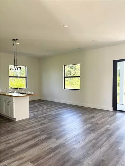 Living - 411 Eisenhower Blvd, Lehigh Acres, FL 33974 photo 1 of 1