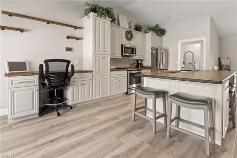 Kitchen - 655 Trinity St E, Lehigh Acres, FL 33974 photo 1 of 4