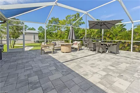 Exterior - 655 Trinity St E, Lehigh Acres, FL 33974 photo 7 of 20