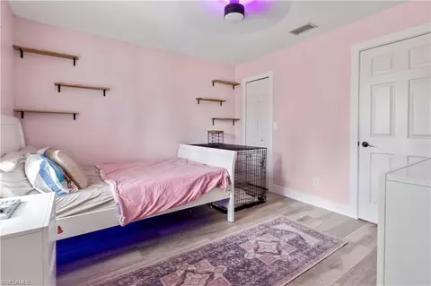 Bedroom - 655 Trinity St E, Lehigh Acres, FL 33974 photo 5 of 6