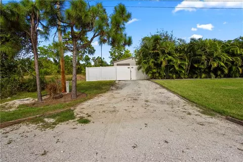 Exterior - 655 Trinity St E, Lehigh Acres, FL 33974 photo 18 of 20
