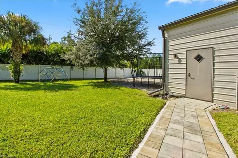 Exterior - 655 Trinity St E, Lehigh Acres, FL 33974 photo 16 of 20