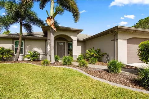 Exterior - 655 Trinity St E, Lehigh Acres, FL 33974 photo 4 of 20