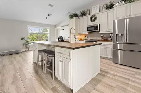 Kitchen - 655 Trinity St E, Lehigh Acres, FL 33974 photo 2 of 4