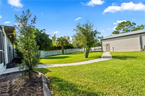 Exterior - 655 Trinity St E, Lehigh Acres, FL 33974 photo 11 of 20
