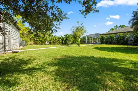 Exterior - 655 Trinity St E, Lehigh Acres, FL 33974 photo 12 of 20