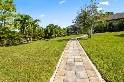 Exterior - 655 Trinity St E, Lehigh Acres, FL 33974 photo 15 of 20