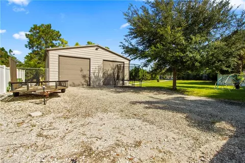 Exterior - 655 Trinity St E, Lehigh Acres, FL 33974 photo 17 of 20
