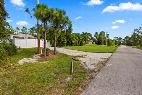 Exterior - 655 Trinity St E, Lehigh Acres, FL 33974 photo 19 of 20