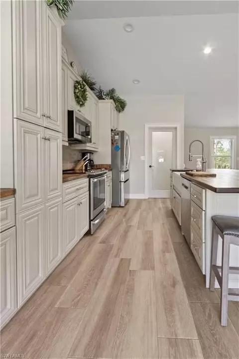 Kitchen - 655 Trinity St E, Lehigh Acres, FL 33974 photo 4 of 4