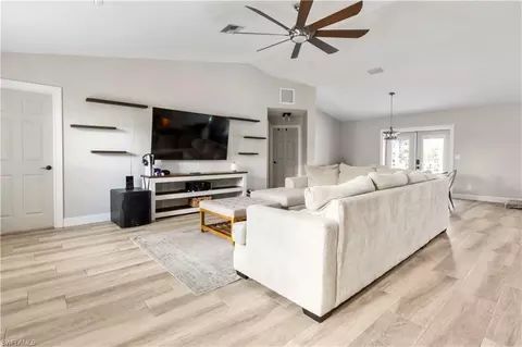 Living - 655 Trinity St E, Lehigh Acres, FL 33974 photo 1 of 2