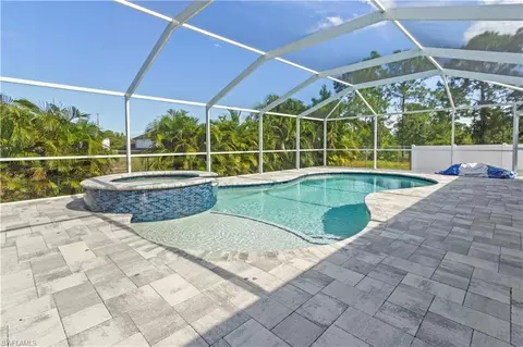 Exterior - 655 Trinity St E, Lehigh Acres, FL 33974 photo 5 of 20