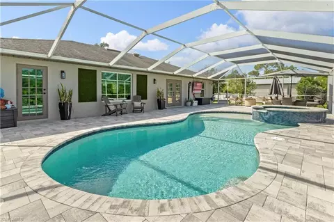 Exterior - 655 Trinity St E, Lehigh Acres, FL 33974 photo 6 of 20