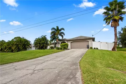 Exterior - 655 Trinity St E, Lehigh Acres, FL 33974 photo 3 of 20