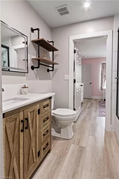 Bath - 655 Trinity St E, Lehigh Acres, FL 33974 photo 2 of 4