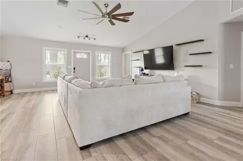 Living - 655 Trinity St E, Lehigh Acres, FL 33974 photo 2 of 2