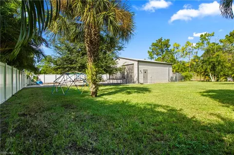 Exterior - 655 Trinity St E, Lehigh Acres, FL 33974 photo 2 of 20