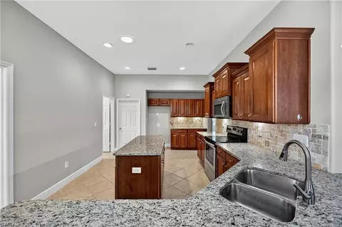 Kitchen - 13502 Loreo Ct, Estero, FL 33928 photo 5 of 5