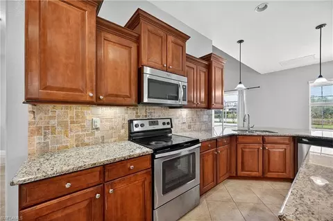 Kitchen - 13502 Loreo Ct, Estero, FL 33928 photo 4 of 5