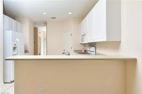 Kitchen - 4808 Fairloop Run, Lehigh Acres, FL 33973 photo 2 of 4