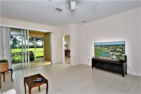 Living - 4808 Fairloop Run, Lehigh Acres, FL 33973 photo 3 of 5