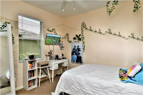 Bedroom - 4808 Fairloop Run, Lehigh Acres, FL 33973 photo 3 of 4