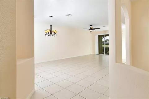 Living - 4808 Fairloop Run, Lehigh Acres, FL 33973 photo 4 of 5
