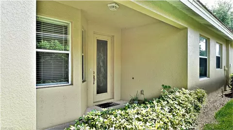Exterior - 4808 Fairloop Run, Lehigh Acres, FL 33973 photo 1 of 11