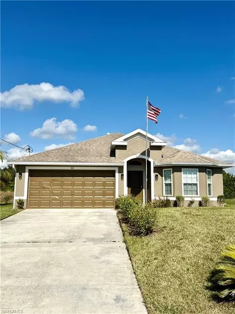 815 Theodore Vail St E, Lehigh Acres, FL 33974