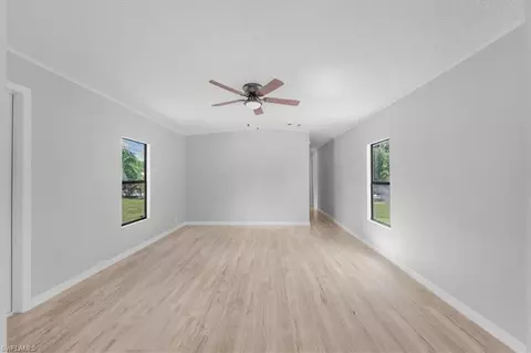 Living - 671 Bennett Ave, Labelle, FL 33935 photo 1 of 2