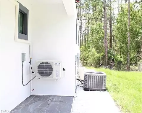 Exterior - 3306 E 2nd St, Lehigh Acres, FL 33936 photo 6 of 7