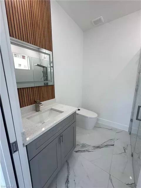 Bath - 3306 E 2nd St, Lehigh Acres, FL 33936 photo 6 of 8