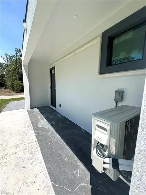 Exterior - 3306 E 2nd St, Lehigh Acres, FL 33936 photo 5 of 7