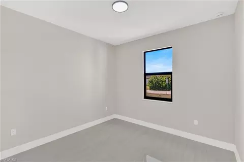 Bedroom - 545 Chalet Ave S, Lehigh Acres, FL 33974 photo 2 of 4