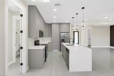 Kitchen - 545 Chalet Ave S, Lehigh Acres, FL 33974 photo 3 of 5