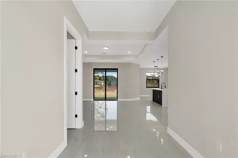 Entry Way - 545 Chalet Ave S, Lehigh Acres, FL 33974 photo 1 of 2