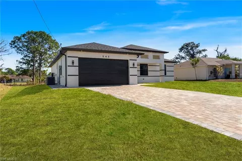Exterior - 545 Chalet Ave S, Lehigh Acres, FL 33974 photo 1 of 5