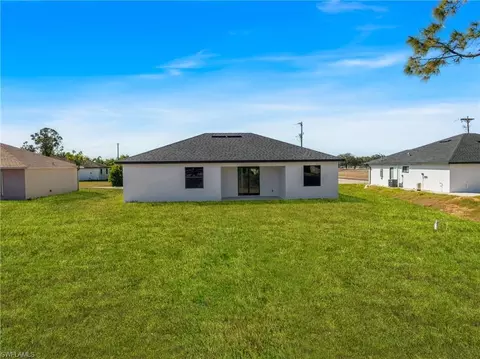 Exterior - 545 Chalet Ave S, Lehigh Acres, FL 33974 photo 3 of 5