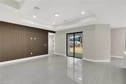 Living - 545 Chalet Ave S, Lehigh Acres, FL 33974 photo 4 of 6
