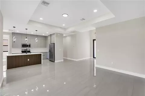 Living - 545 Chalet Ave S, Lehigh Acres, FL 33974 photo 2 of 6