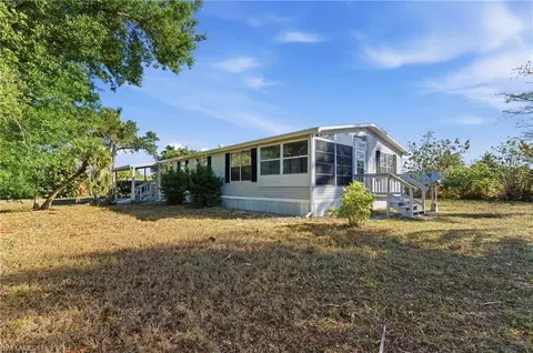 Exterior - 11250 Stringfellow Rd, Bokeelia, FL 33922 photo 2 of 8