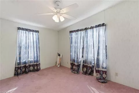 Bedroom - 11250 Stringfellow Rd, Bokeelia, FL 33922 photo 4 of 5