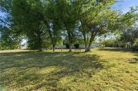 Exterior - 11250 Stringfellow Rd, Bokeelia, FL 33922 photo 4 of 8