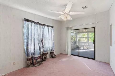 Bedroom - 11250 Stringfellow Rd, Bokeelia, FL 33922 photo 3 of 5