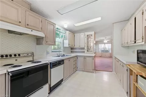 Kitchen - 11250 Stringfellow Rd, Bokeelia, FL 33922 photo 3 of 5