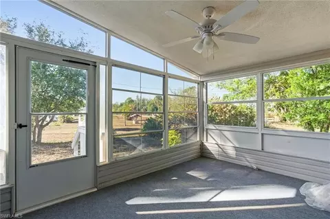 Exterior - 11250 Stringfellow Rd, Bokeelia, FL 33922 photo 7 of 8